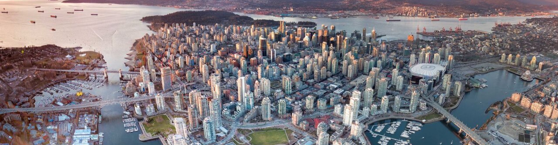 Vancouver night skyline with lights reflecting on water